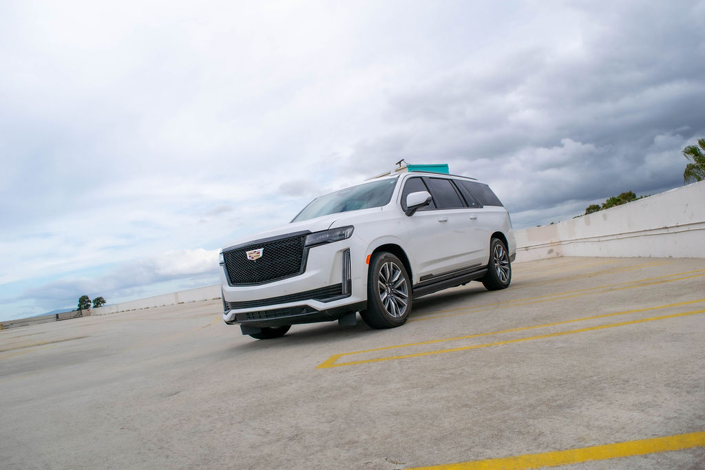 White Cadillac Escalade ESV Sport Platinum, 7 seats and 4 doors, rental in Orange County