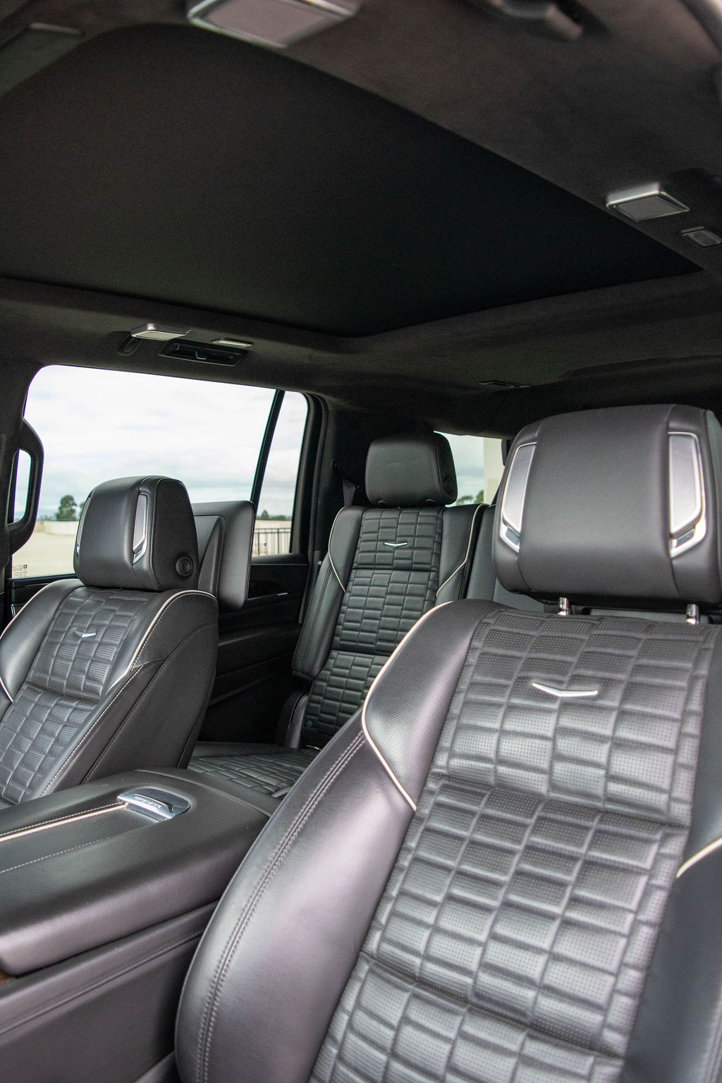 White Cadillac Escalade ESV Sport Platinum luxury SUV, Black cabin, delivered in Orange County