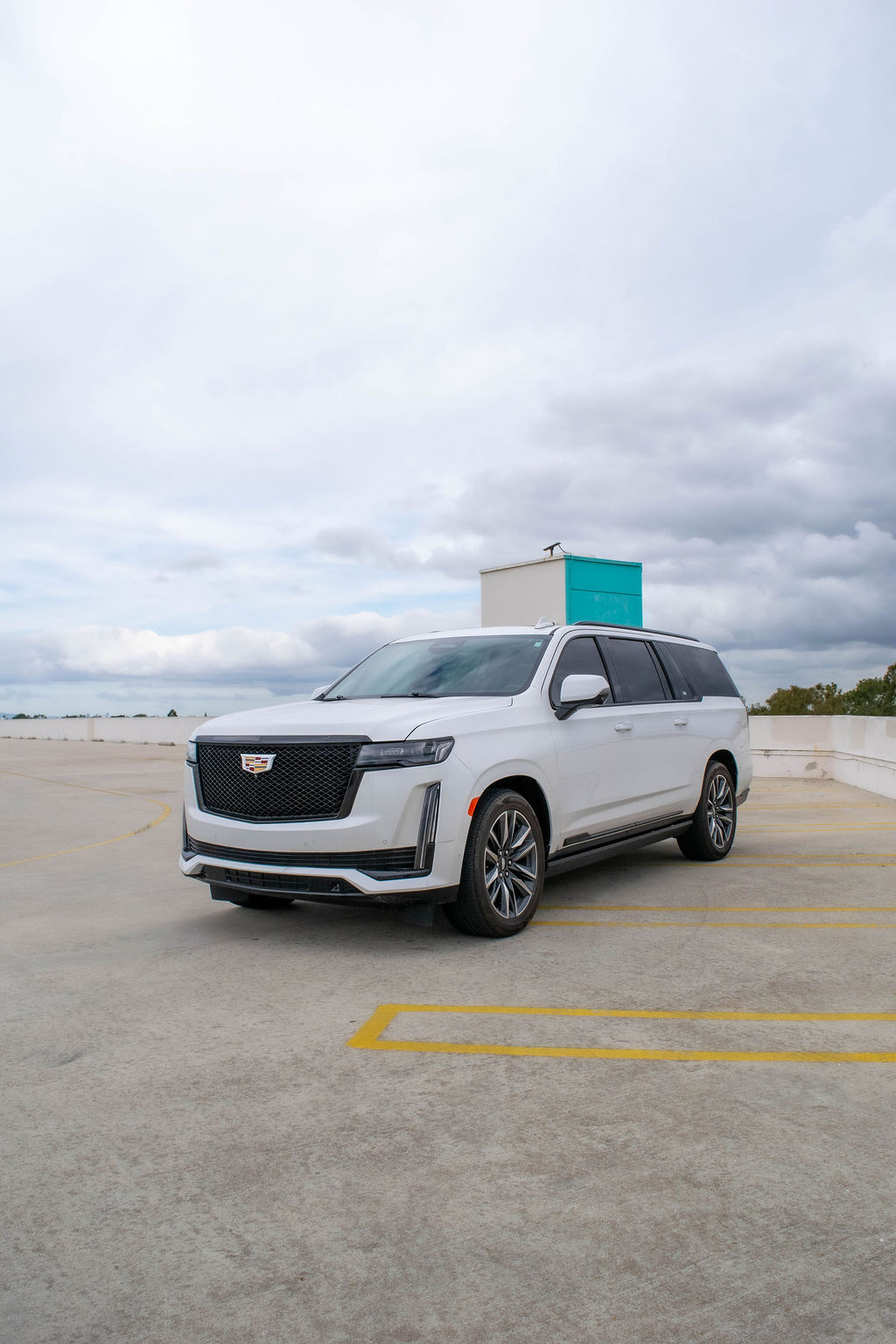 Cadillac Escalade ESV Sport Platinum luxury SUV in White, available for rental in Orange County, CA
