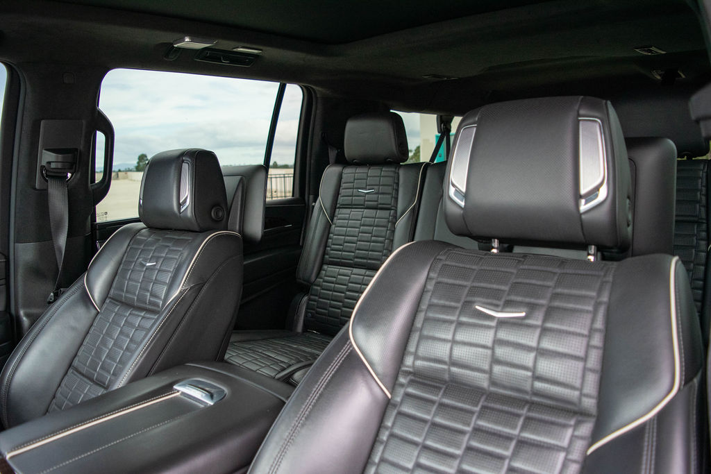 Cadillac Escalade ESV Sport Platinum in White over Black, luxury SUV rental in Orange County