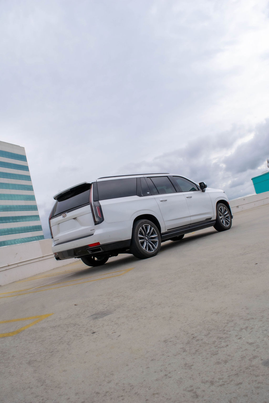 White Cadillac Escalade ESV Sport Platinum luxury SUV rental delivered across Orange County, CA