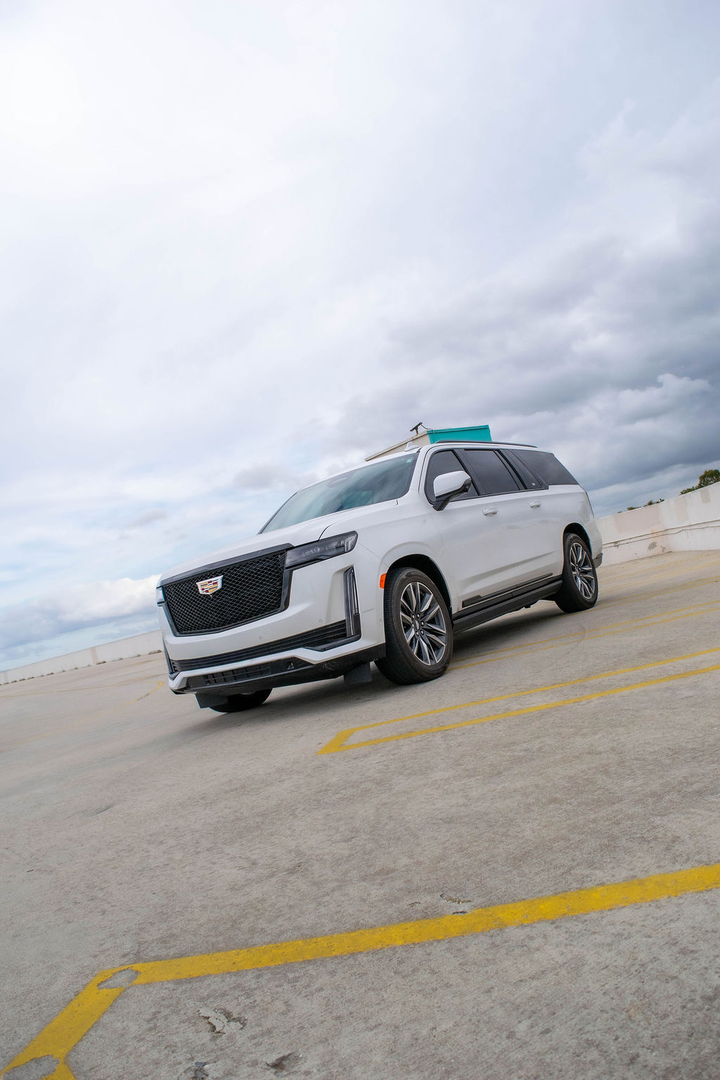 White Cadillac Escalade ESV Sport Platinum luxury SUV, RWD, rental in Orange County, CA
