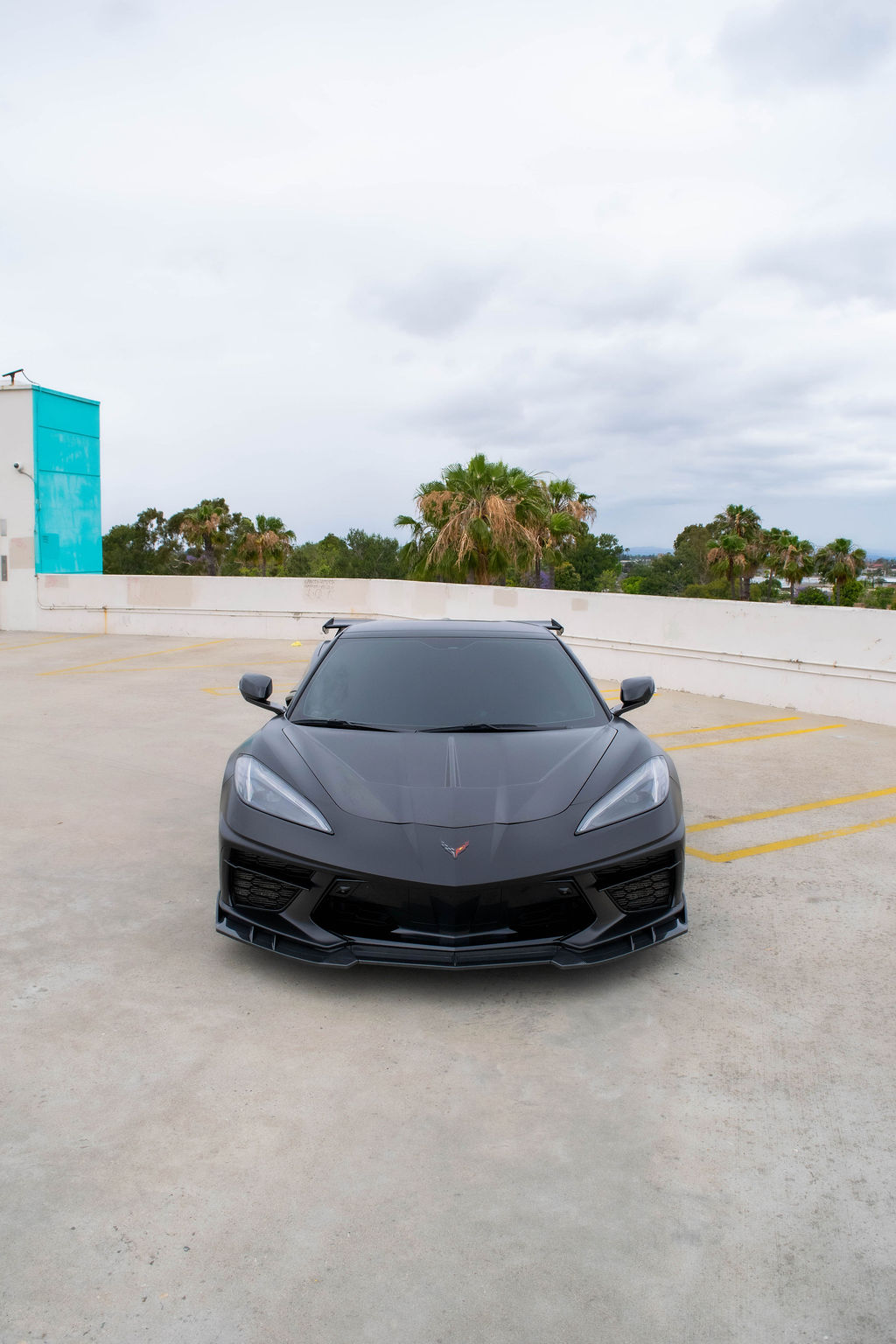 Chevrolet Corvette C8 Stingray sports car in Black, available for rental in Orange County, CA