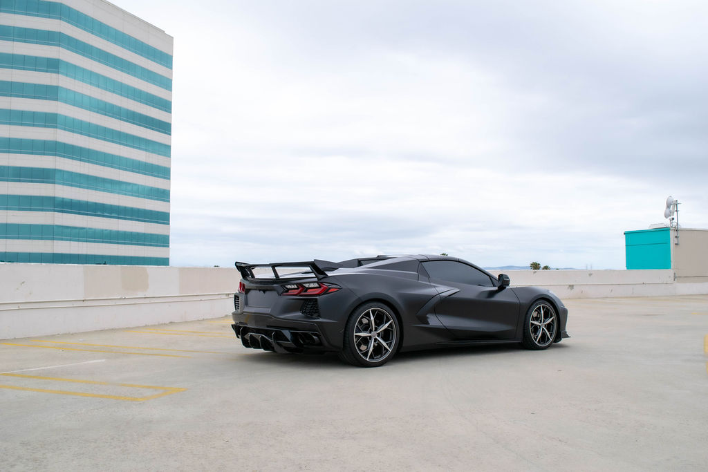 Black Chevrolet Corvette C8 Stingray sports car, White cabin, delivered in Orange County