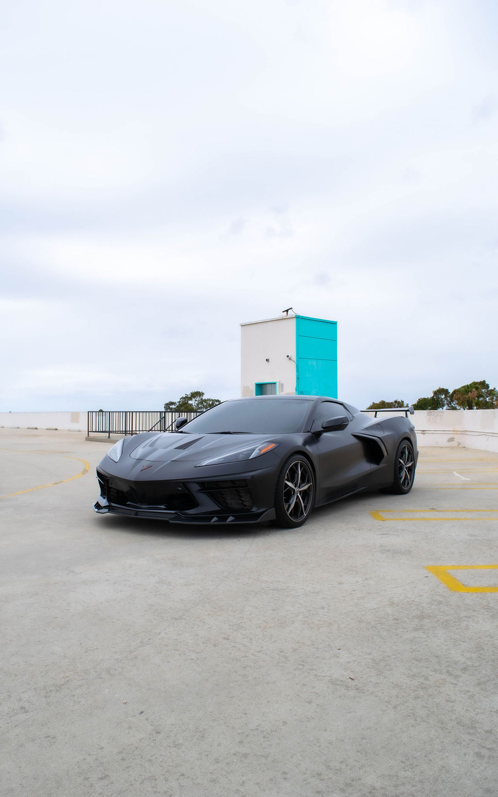 Black Chevrolet Corvette C8 Stingray, a 2 door sports car for hire in Orange County