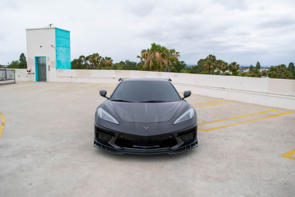 Black Chevrolet Corvette C8 Stingray sports car with 2 seat cabin, Orange County rental