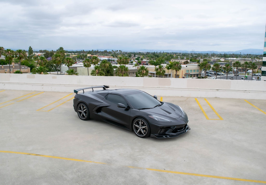 Black Chevrolet Corvette C8 Stingray RWD sports car, exotic rental in Orange County