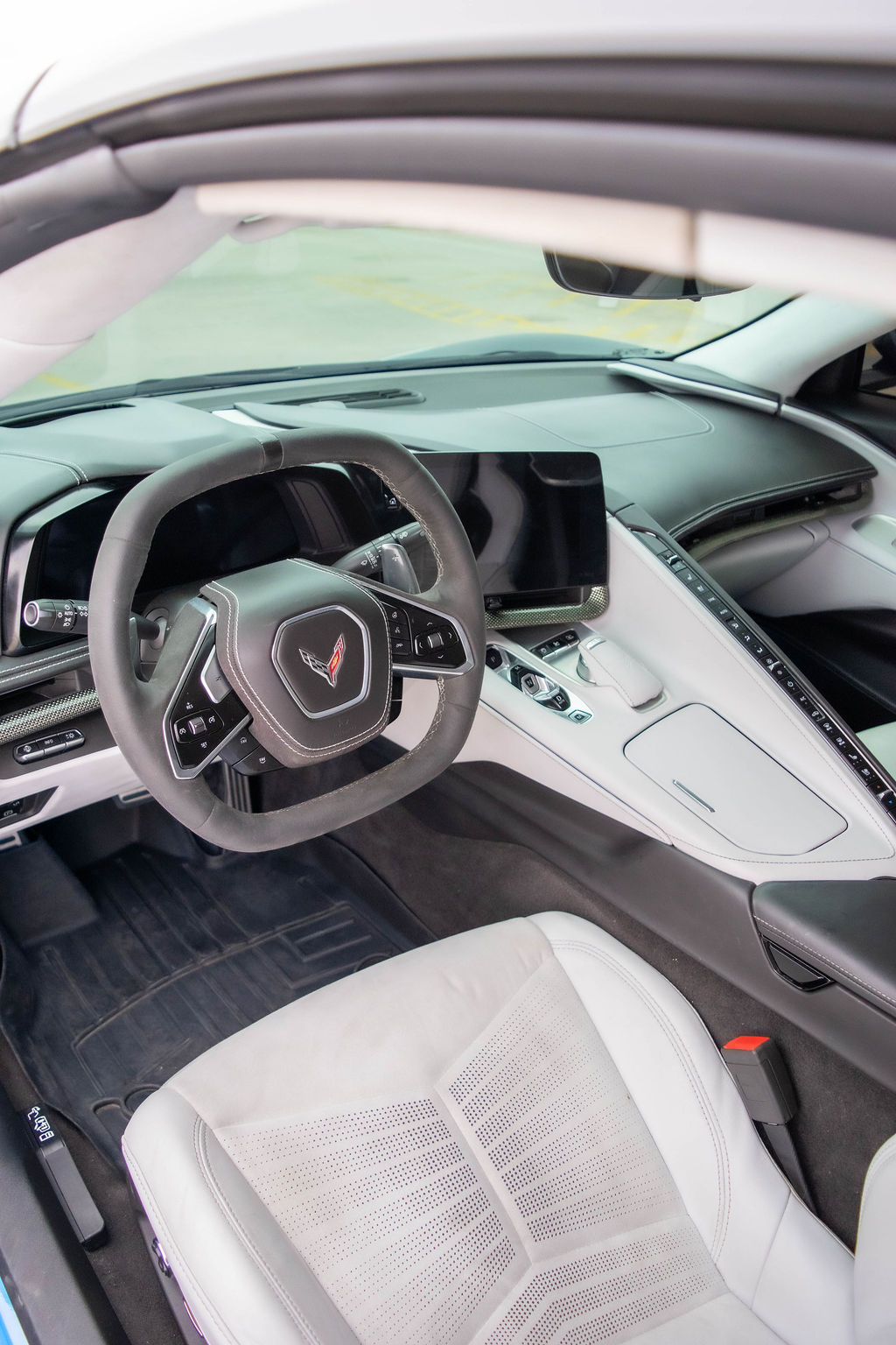 Black Chevrolet Corvette C8 Stingray sports car rental delivered across Orange County, CA