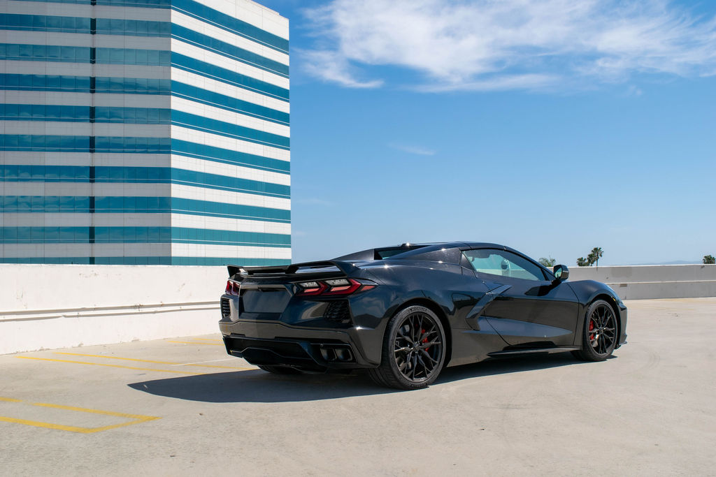 Black Chevrolet Corvette C8 Stingray sports car, Black and Red cabin, delivered in Orange County