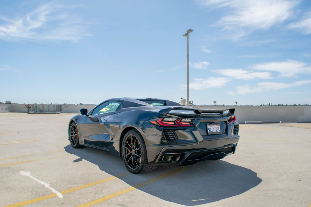 Black Chevrolet Corvette C8 Stingray sports car with 2 seat cabin, Orange County rental, Black and Red interior
