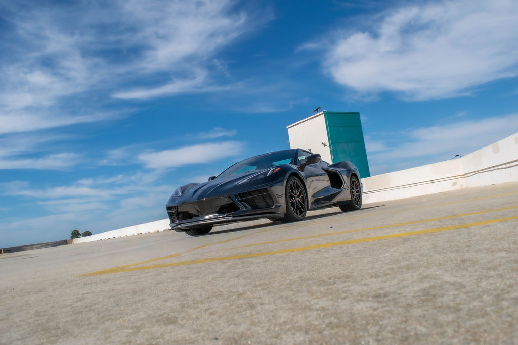 Chevrolet Corvette C8 Stingray in Black over Black and Red, sports car rental in Orange County