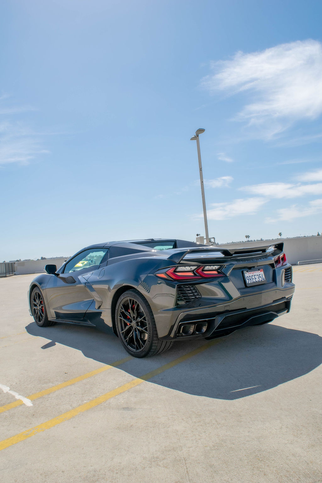 Black Chevrolet Corvette C8 Stingray sports car, RWD, rental in Orange County, CA