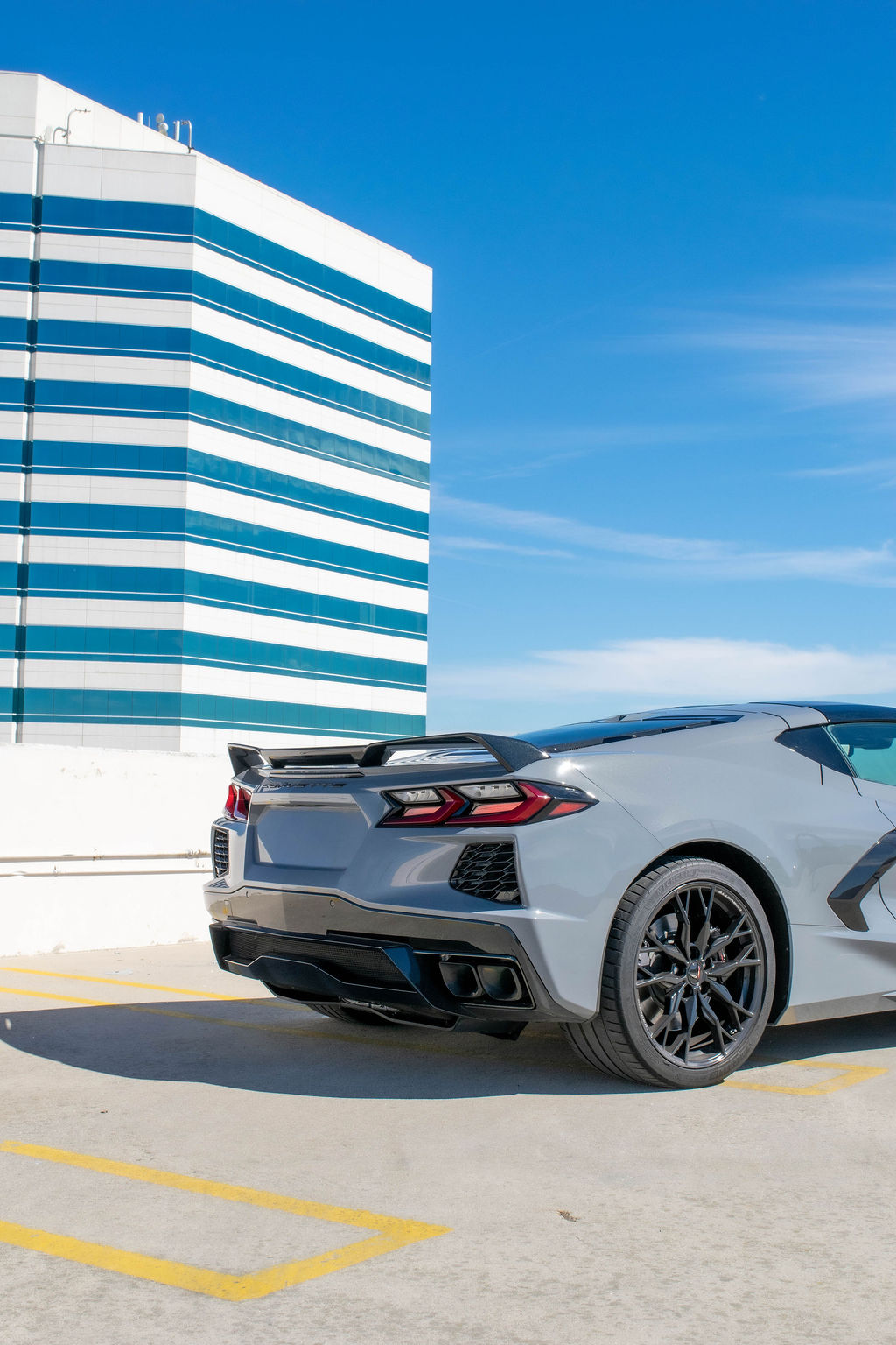 Grey Chevrolet Corvette C8 Stingray sports car available to rent across Orange County, CA