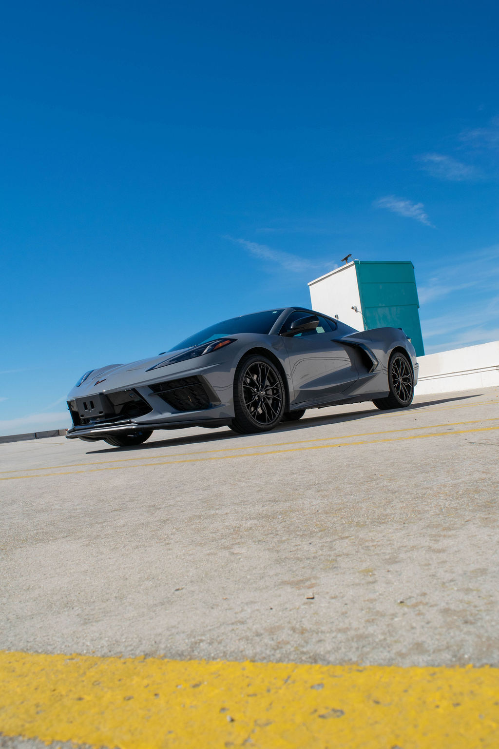 Chevrolet Corvette C8 Stingray sports car in Grey, available for rental in Orange County, CA