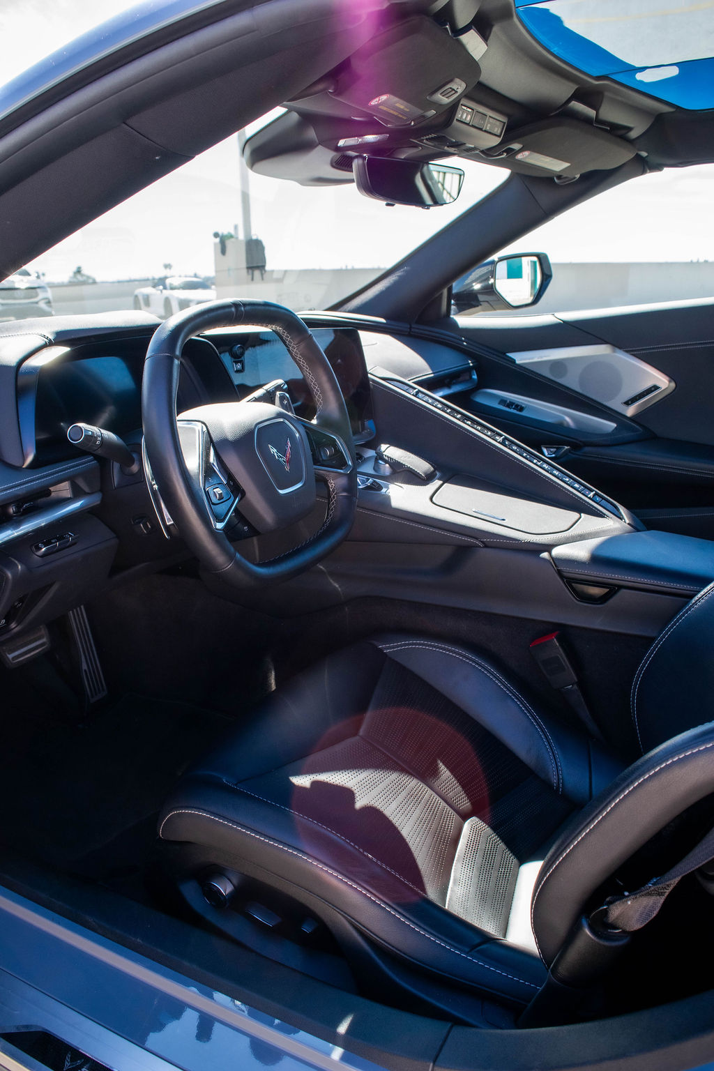 Grey Chevrolet Corvette C8 Stingray, a 2 door sports car for hire in Orange County
