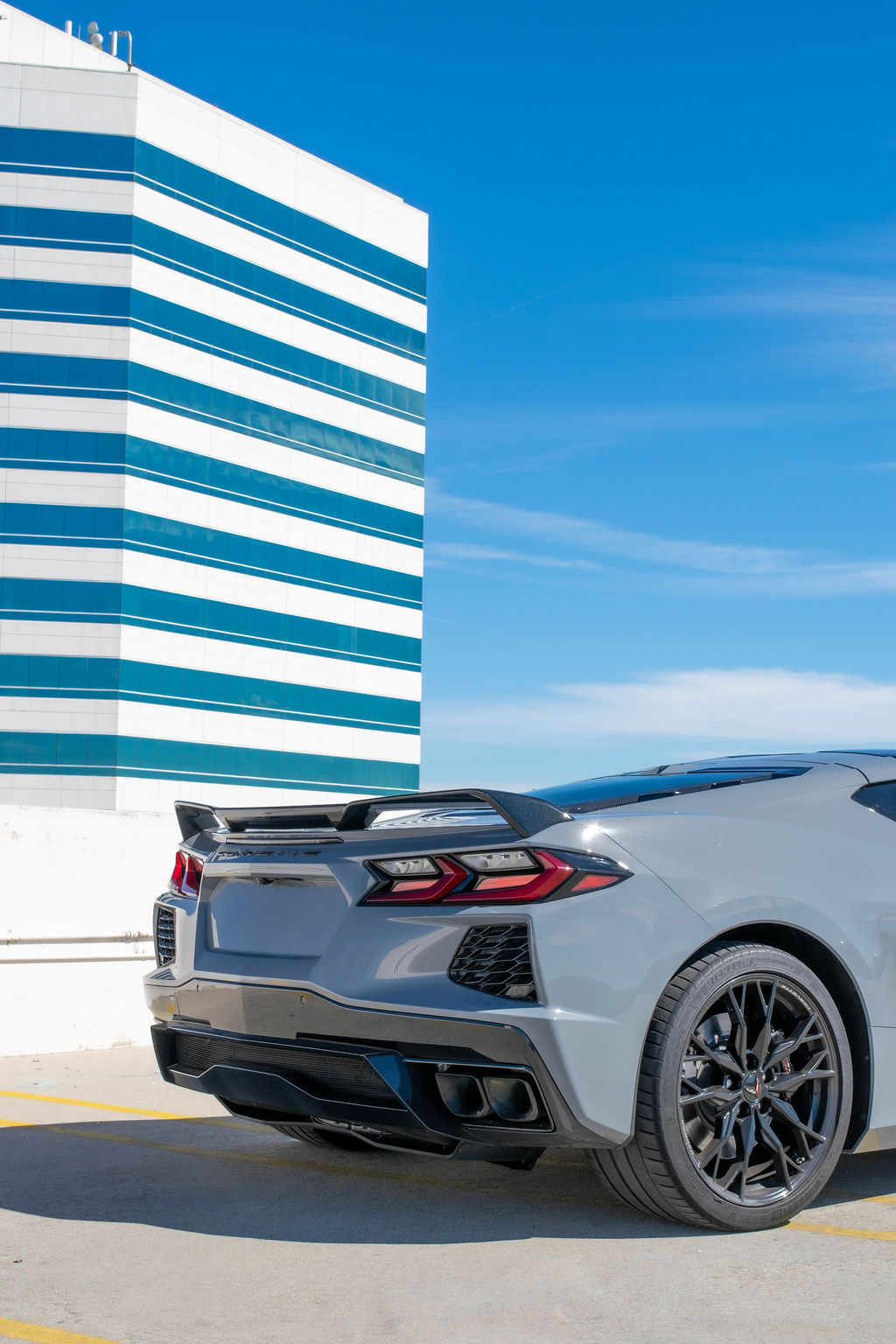 Grey Chevrolet Corvette C8 Stingray sports car with 2 seat cabin, Orange County rental