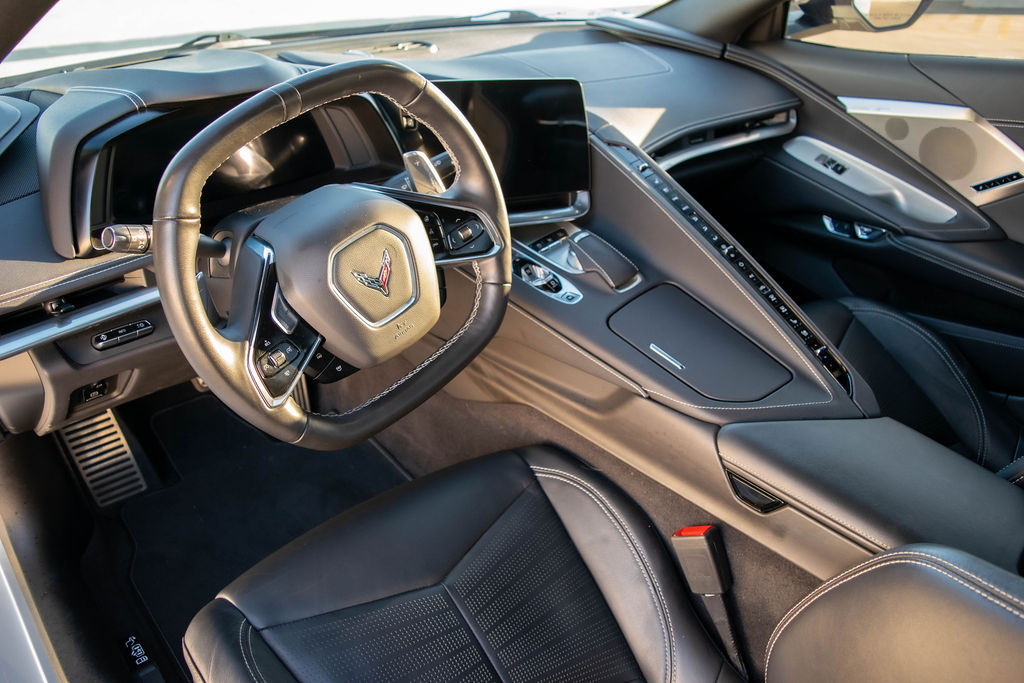 White Chevrolet Corvette C8 Stingray sports car rental delivered across Orange County, CA