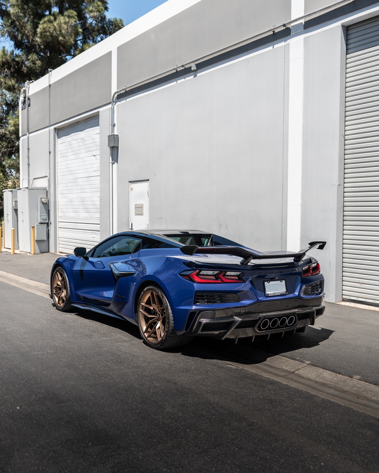 Blue Chevrolet Corvette C8 Z06 sports car, Orange cabin, delivered in Los Angeles
