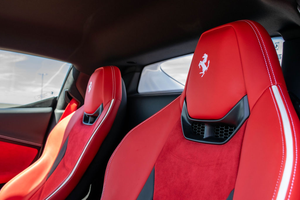 White Ferrari 296 GTB with Red interior for hire across Orange County, CA