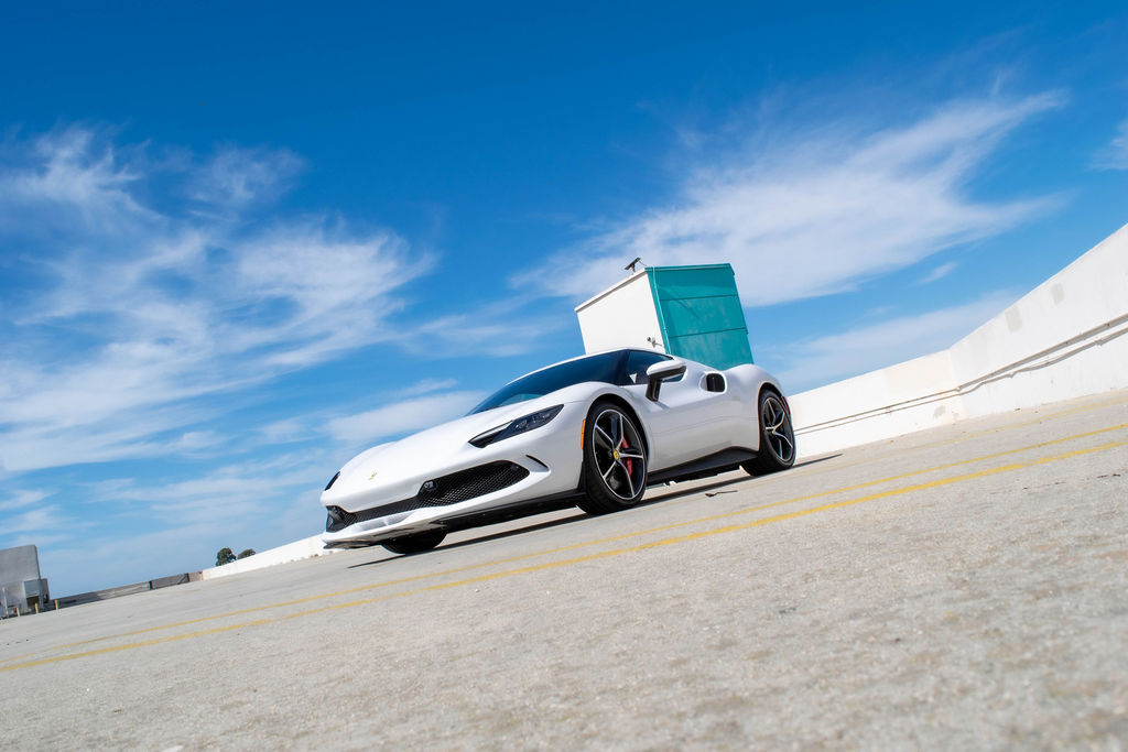 White Ferrari 296 GTB, 2 seat supercar rental in Orange County