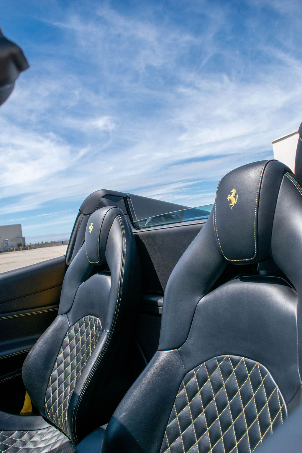 Grey Ferrari 488 Spider, Black and Yellow interior, exotic car rental in Orange County