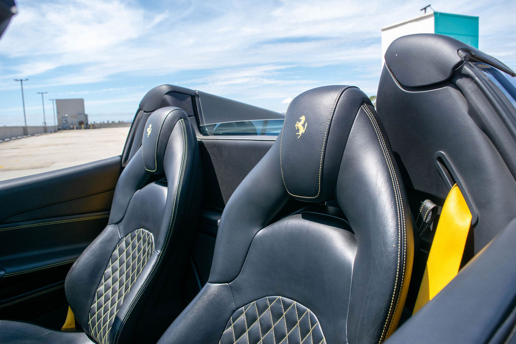 Grey Ferrari 488 Spider convertible supercar for rent in Orange County