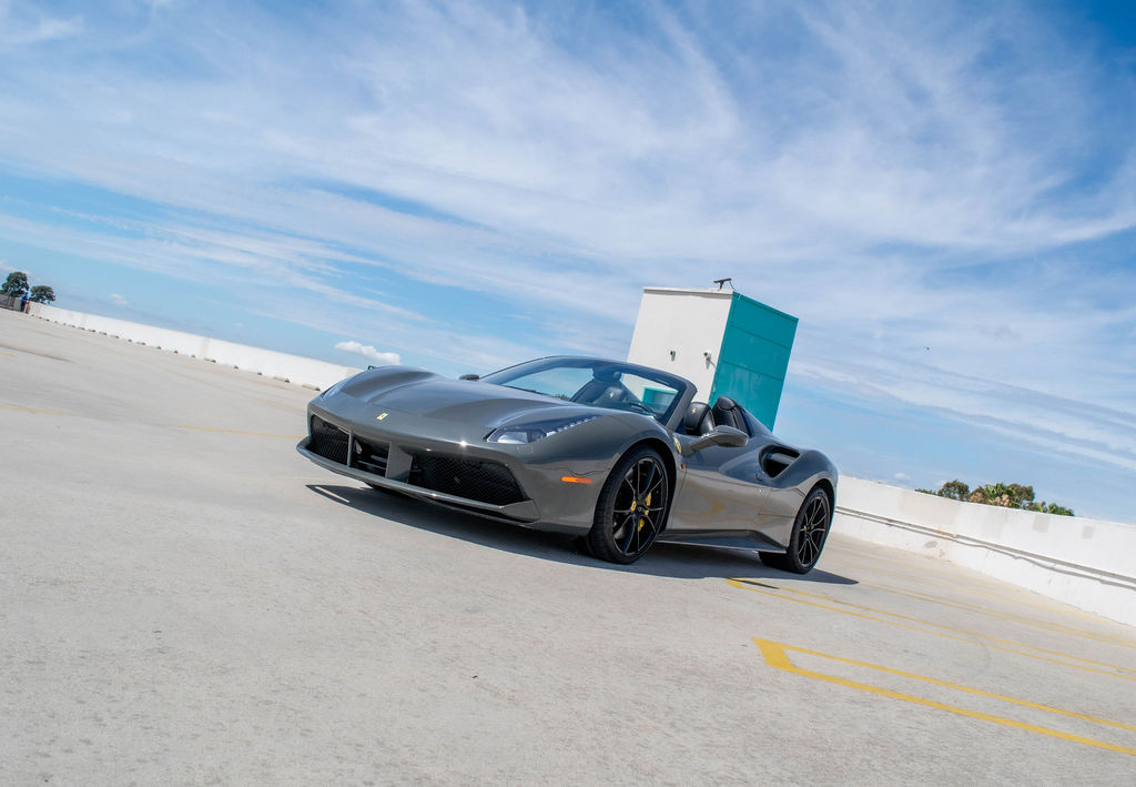 Grey Ferrari 488 Spider convertible, Black and Yellow interior, rental in Orange County, CA