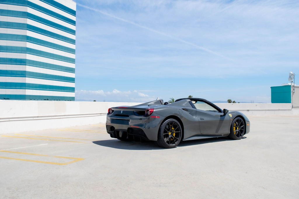 Grey Ferrari 488 Spider, a 2 door supercar for hire in Orange County