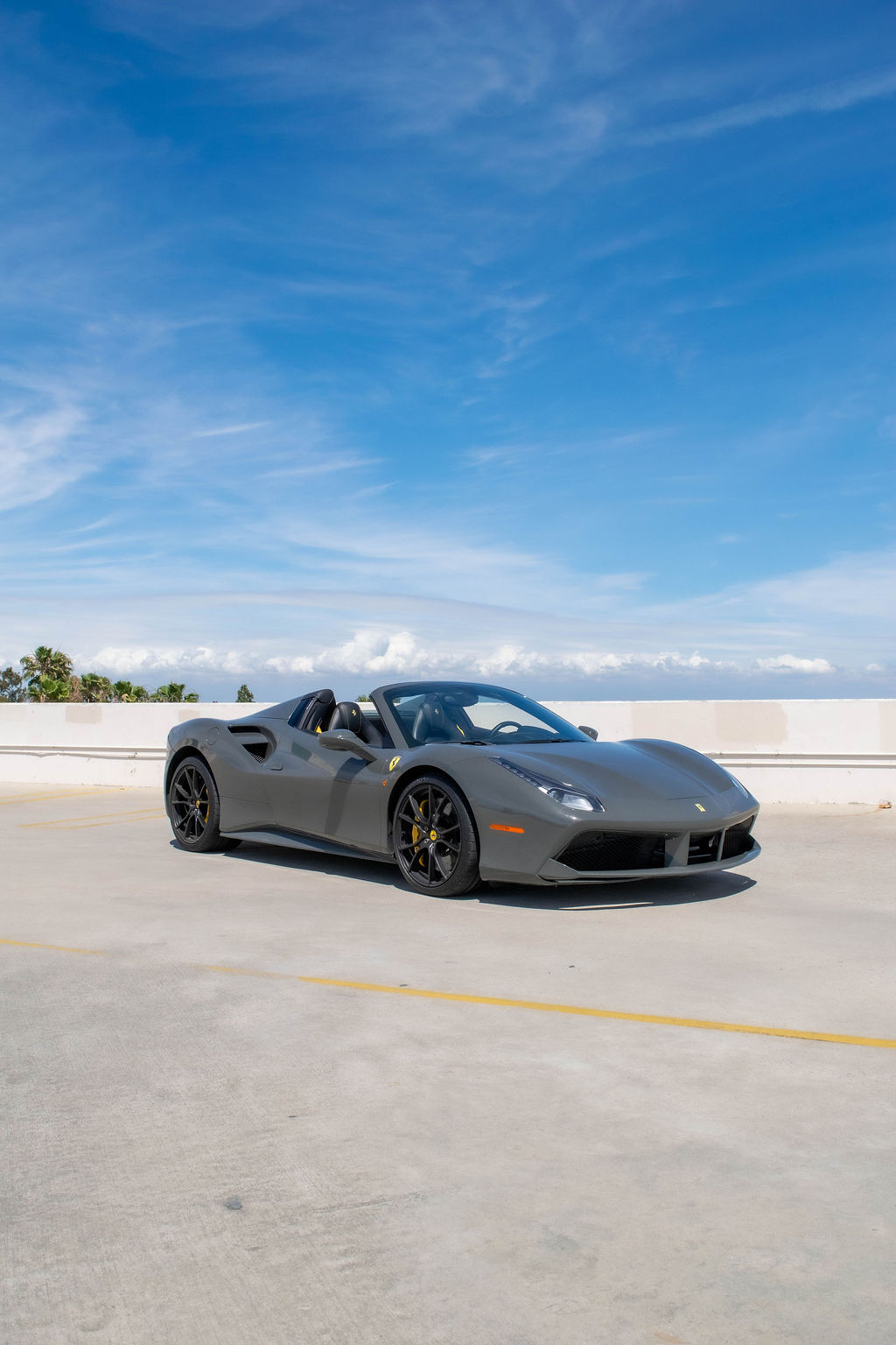 Grey Ferrari 488 Spider supercar with 2 seat cabin, Orange County rental