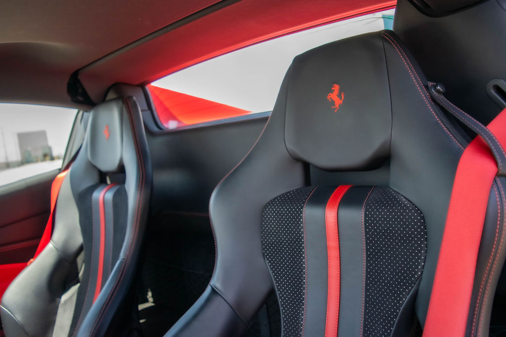 Red Ferrari F8 Spider with RWD drivetrain, supercar rental in Orange County