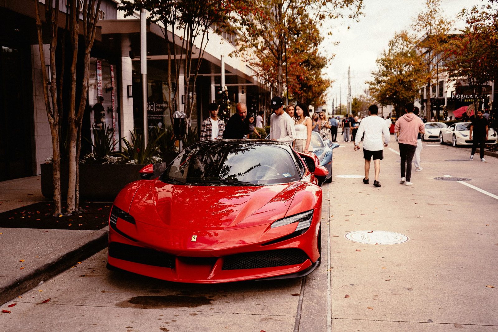 Black Lamborghini Revuelto in a stone showroom, exotic car rental in Southern California