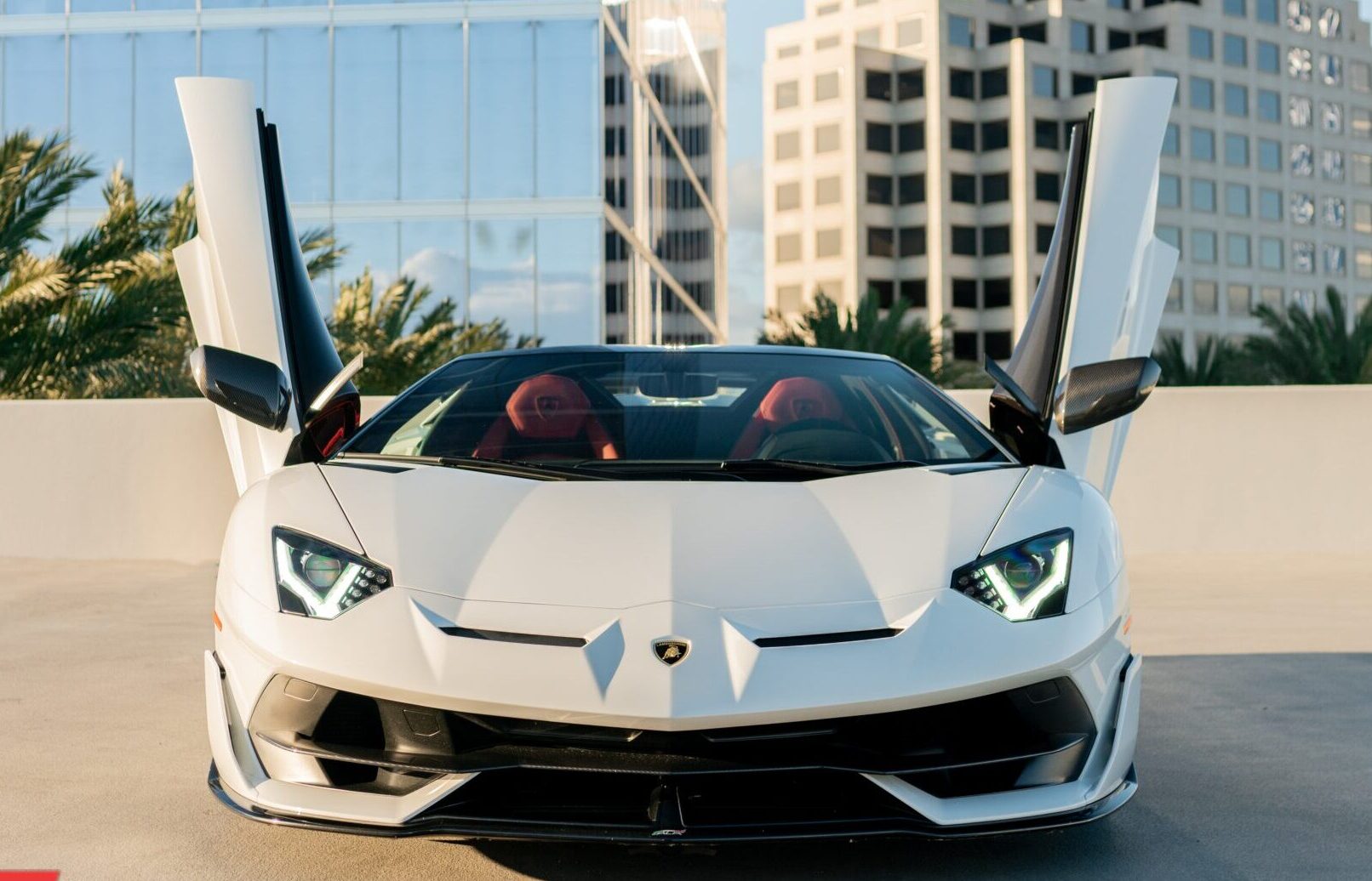 White Lamborghini Aventador SVJ Roadster with Red and Orange interior