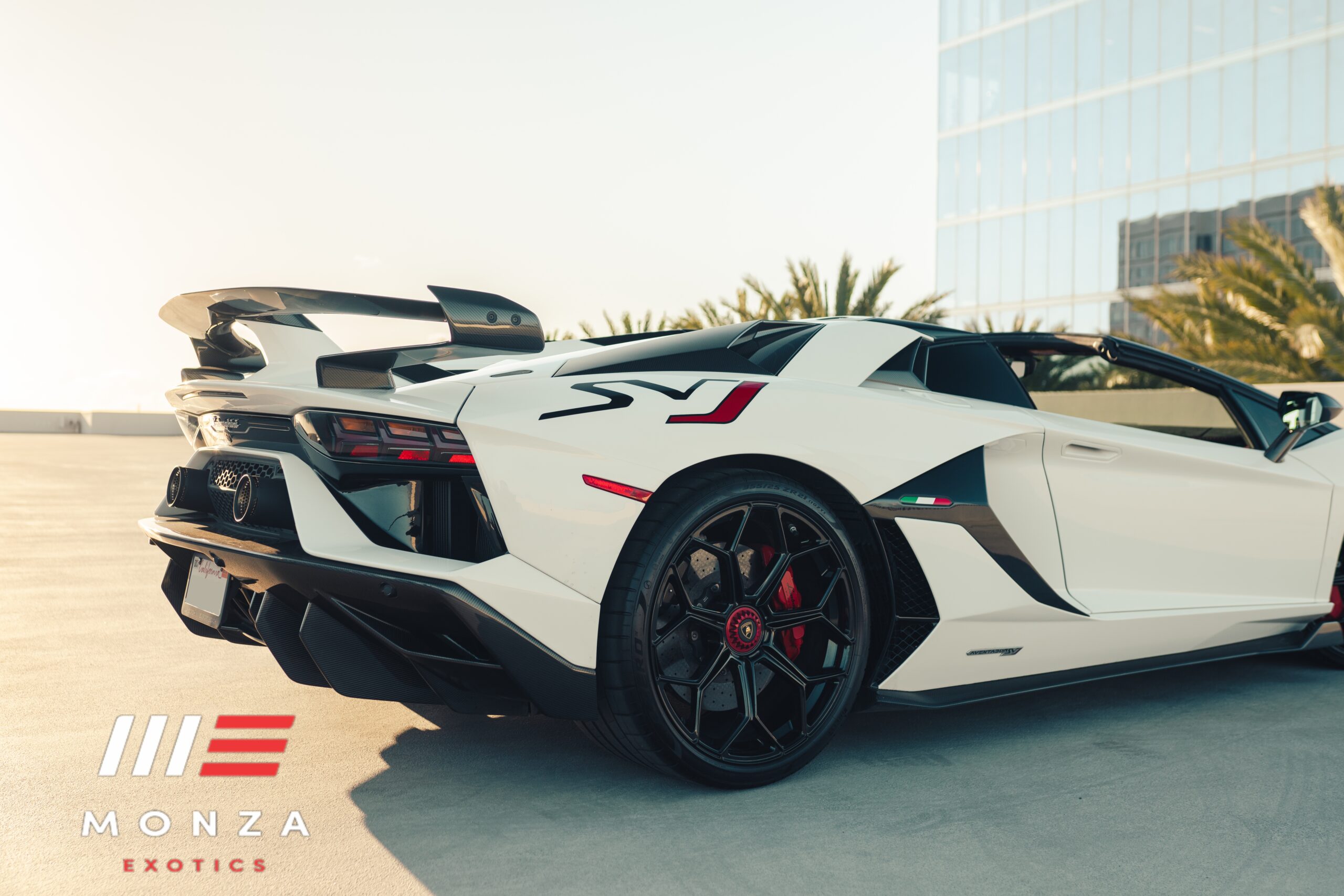 White Lamborghini Aventador SVJ Roadster AWD hypercar rental in Orange County