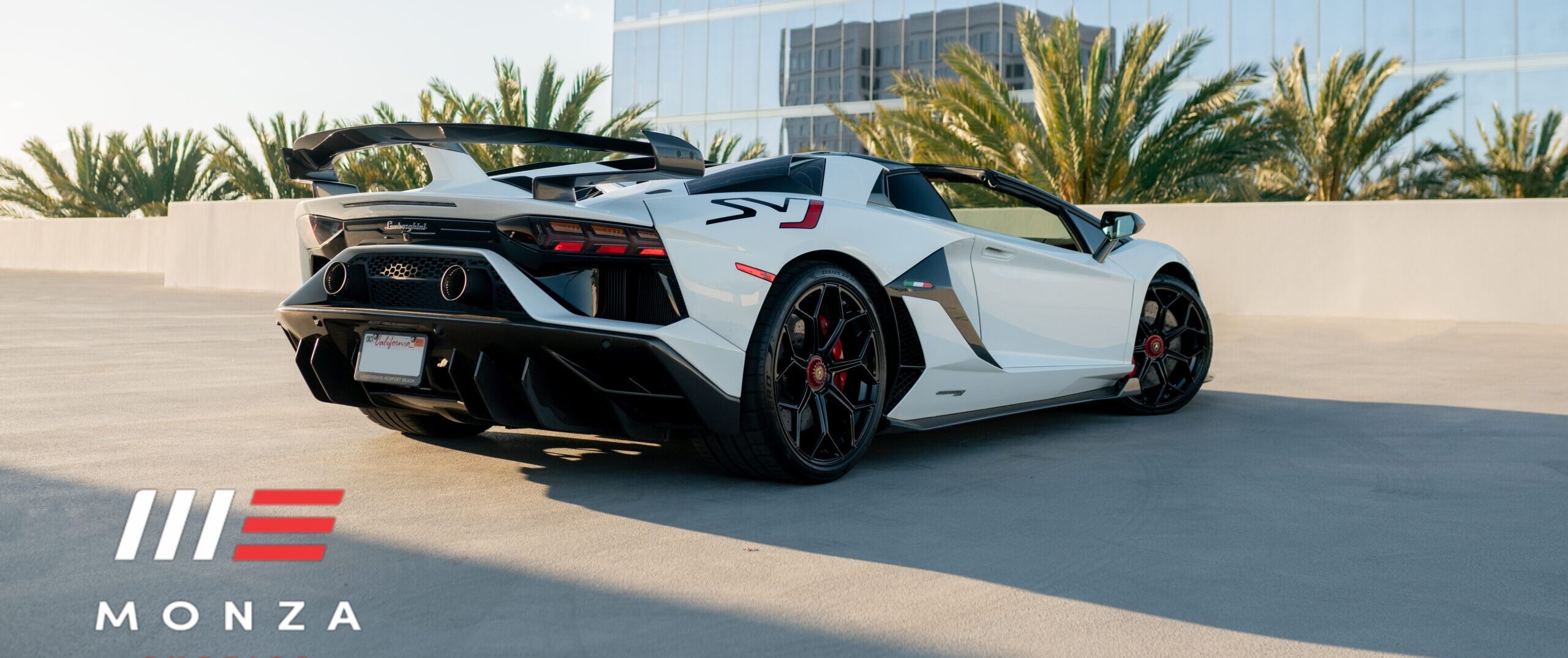 White Lamborghini Aventador SVJ Roadster exotic car rental in Orange County