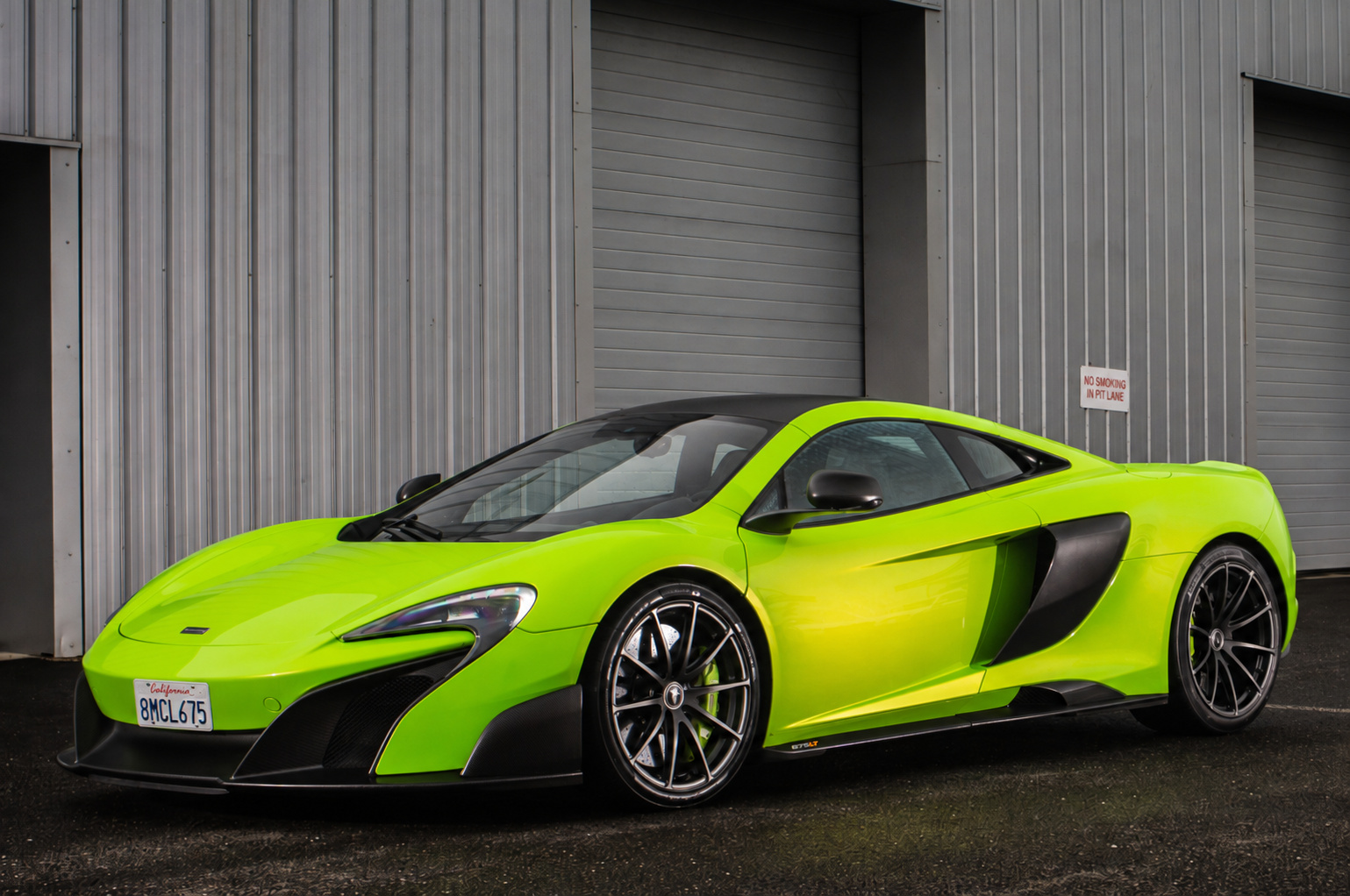 Green McLaren 675LT, front three-quarter view, a 666 hp twin-turbo V8 coupe to rent in Southern California