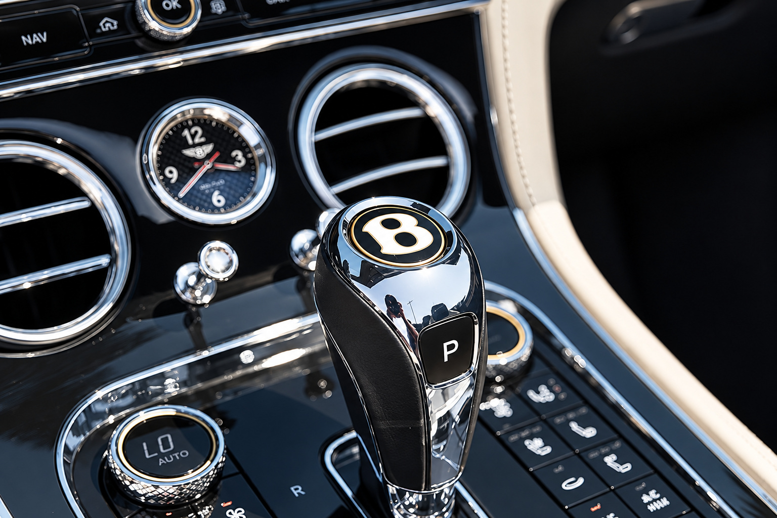 Centre console of the Bentley GTC, Breitling clock, knurled gear lever and organ-stop vent pulls