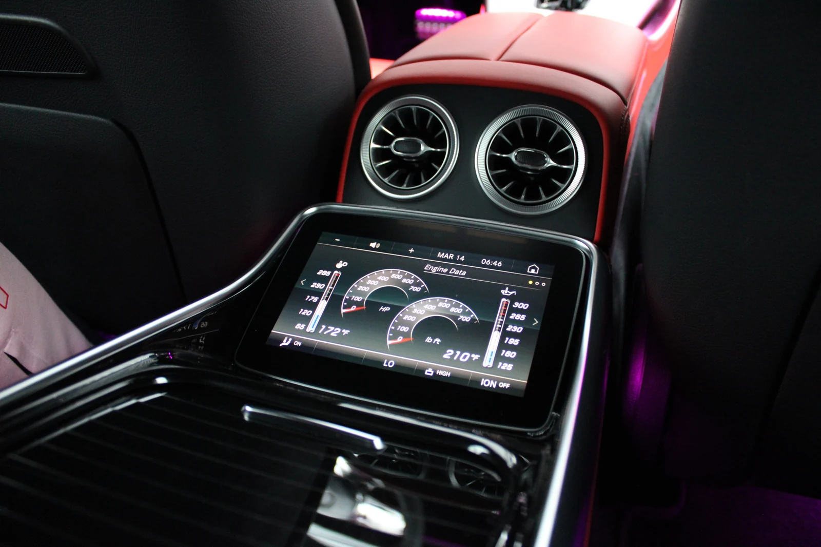 Rear centre console in the Mercedes-AMG GT 63 with its own touchscreen and air vents between the back seats