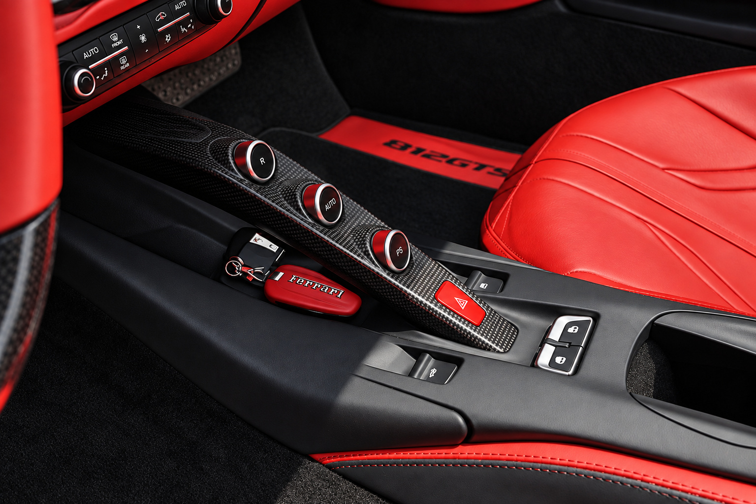 Carbon centre bridge of the Ferrari 812 GTS with the 3 gearbox buttons beside the red leather seat