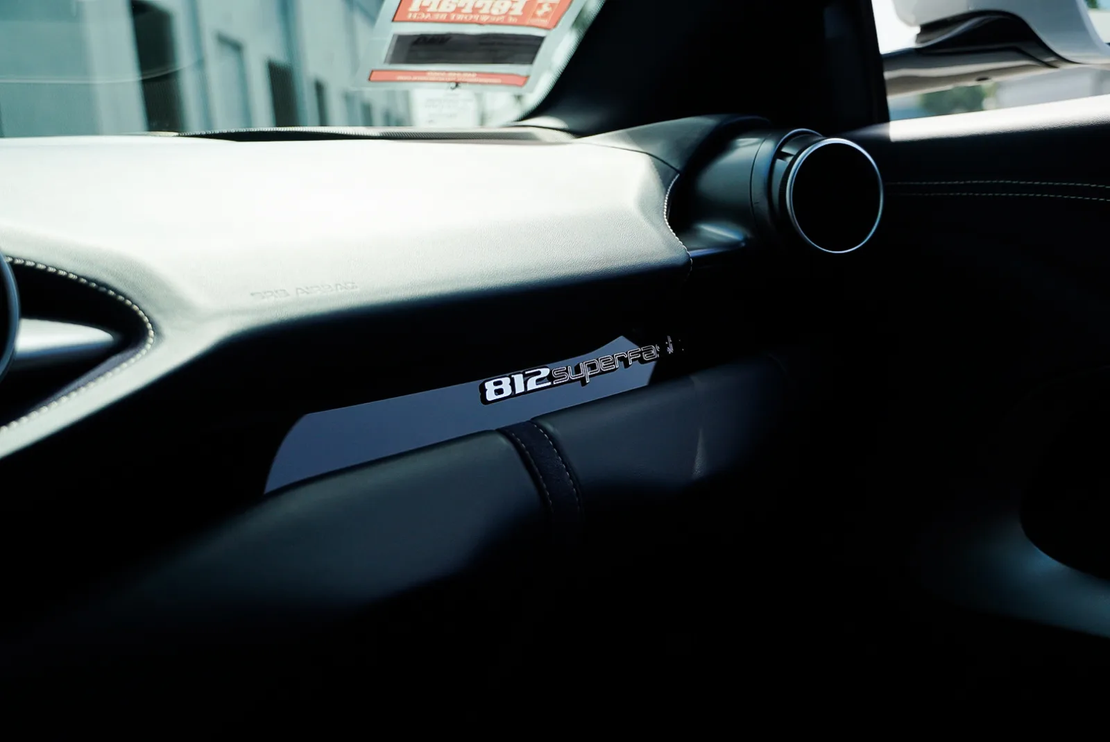 812 Superfast plate on the passenger side of the dash, black leather around the air vent