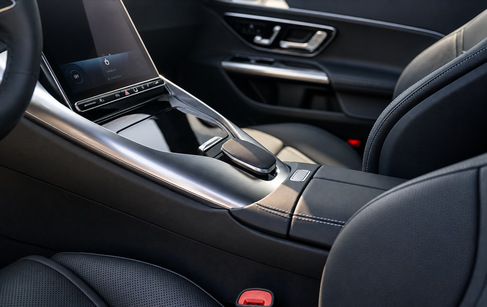 Center console of the Mercedes-Benz AMG GT 43 with the portrait touchscreen and black leather trim