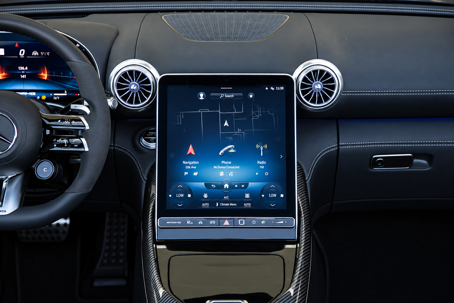 Portrait centre screen of the Mercedes-Benz AMG SL rental, carbon fibre console trim and turbine vents