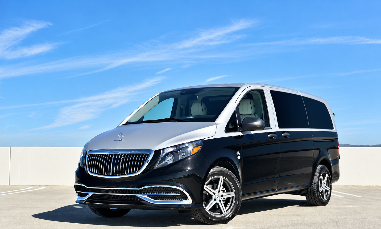 Two-tone Mercedes-Benz Metris, front three-quarter view, a 208 hp turbo 4 cylinder van to rent in Southern California