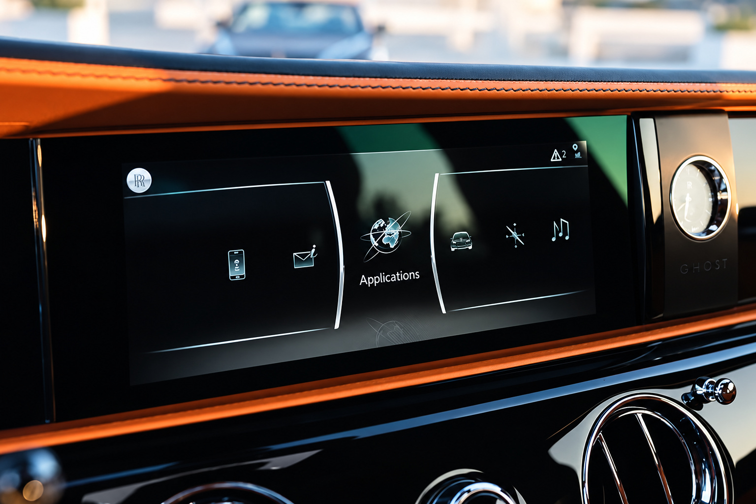 Center screen and orange leather dash top of the Rolls Royce Ghost with the piano black fascia