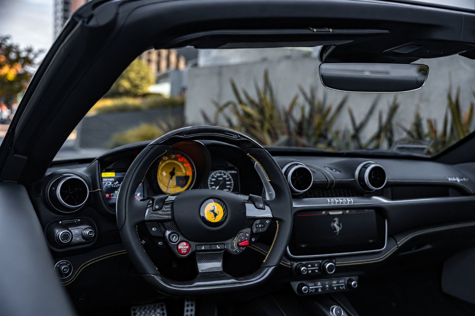 Driver's view of the Portofino dash, central rev counter, steering wheel and the centre touchscreen