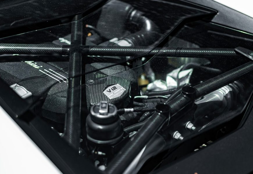 Engine bay of the Lamborghini Aventador SV with the carbon cross brace over the V12