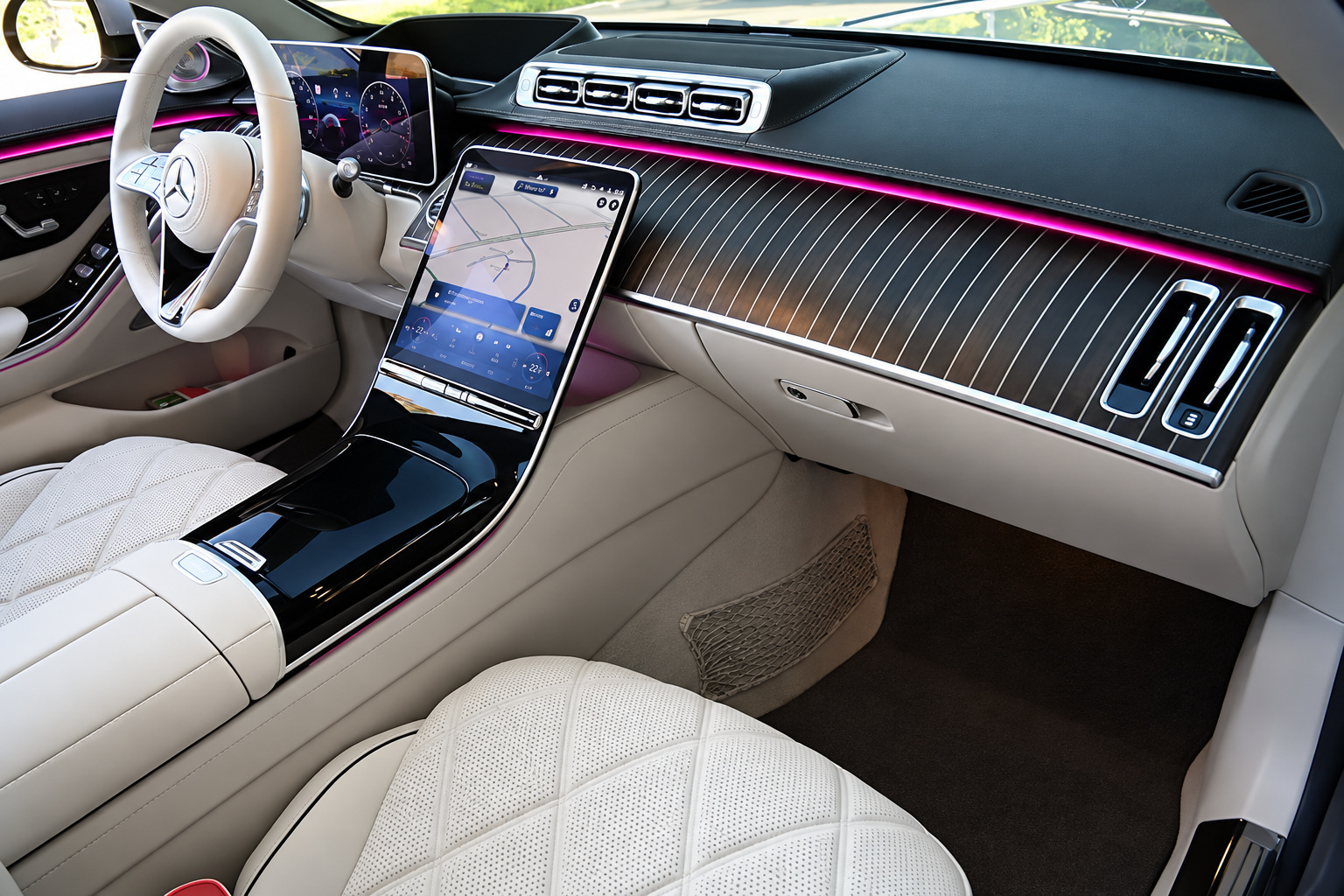 Maybach S580 dashboard with wood trim, portrait screen and rose ambient lighting over cream leather