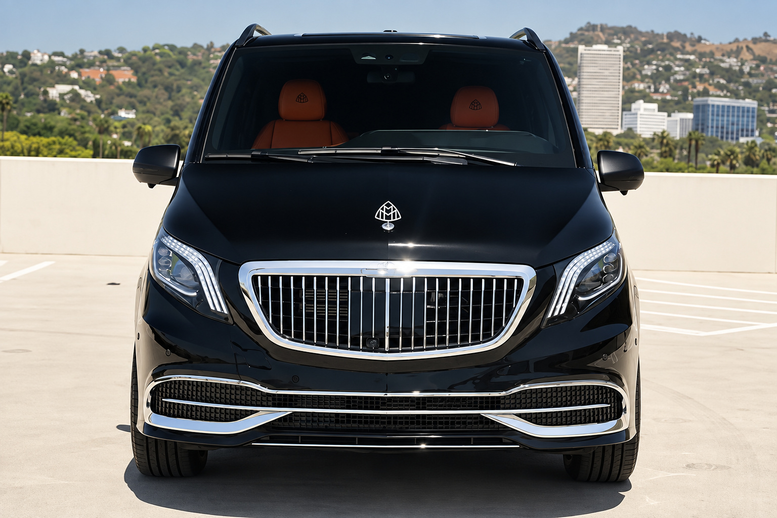 Black Mercedes-Benz Sprinter, front view, a 211 hp turbo diesel luxury van to rent in Southern California