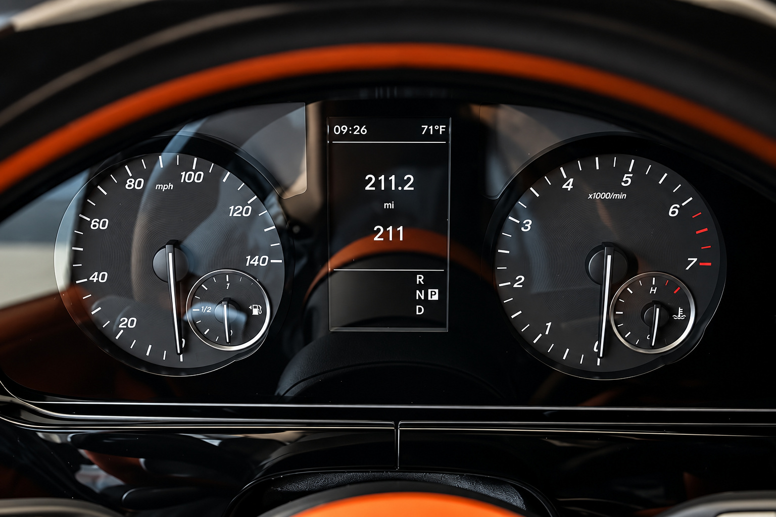 Gauge cluster of the Mercedes-Benz Sprinter rental showing a near-new odometer reading