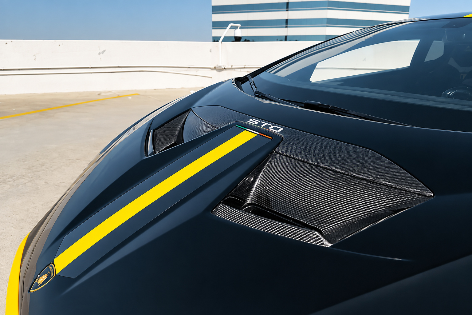 Hood of the Huracan STO from above, carbon vents, yellow stripe and STO lettering