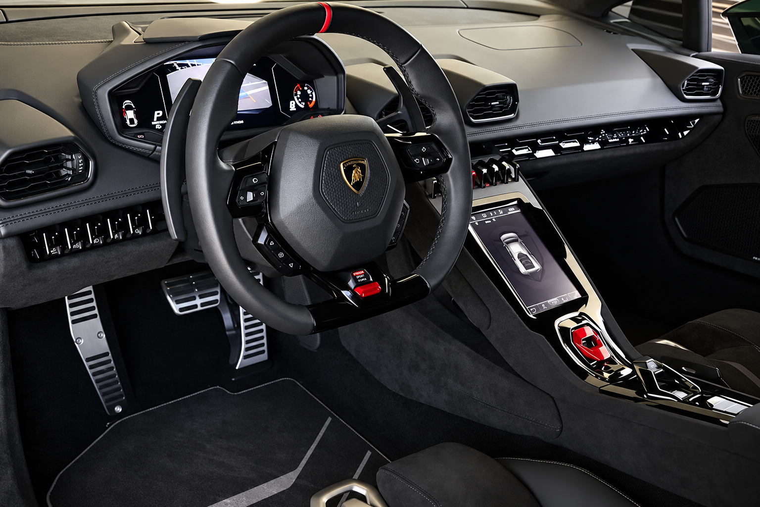Alcantara steering wheel and dash of the Huracan Sterrato with the portrait touchscreen and red start flap